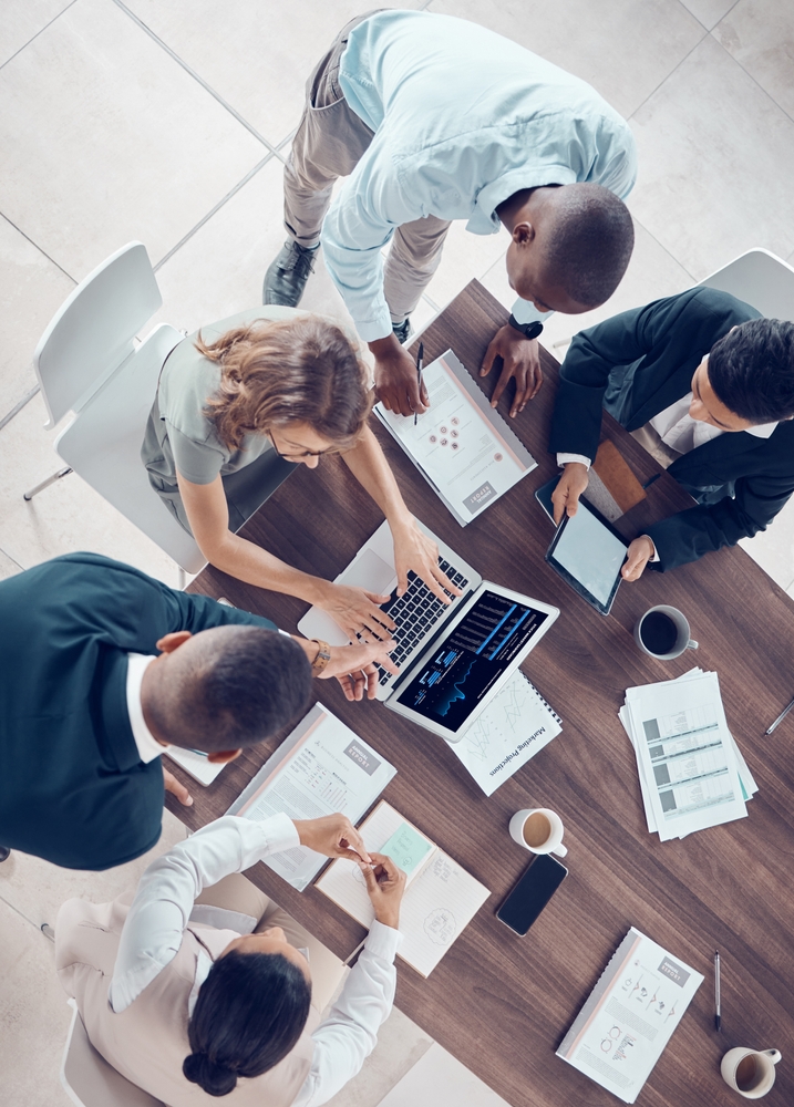 Business people meeting with teamwork, collaboration and analysis of chart, statistics and digital graph analytics.