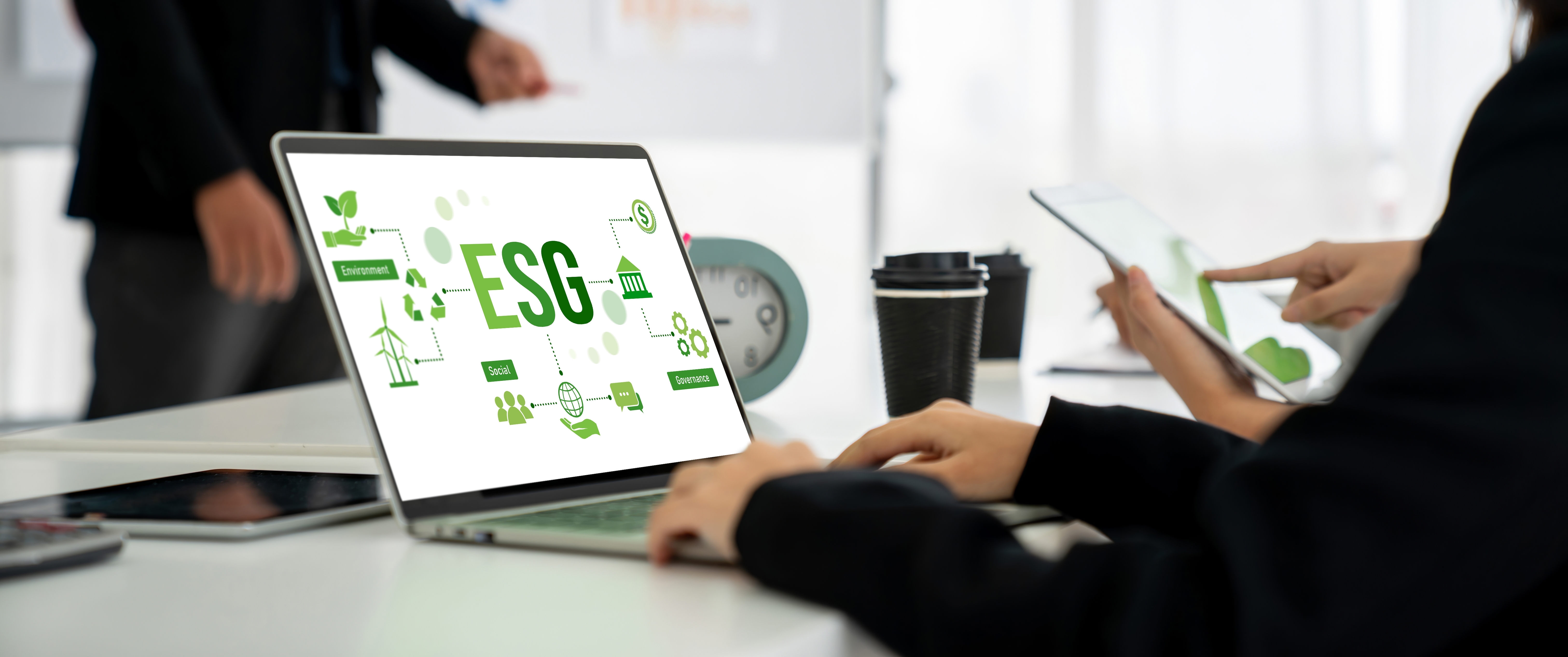 ESG policy displayed on computer screen.