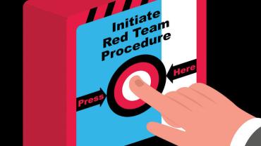 Hand pressing a button labeled Initiate Red Team Procedure.