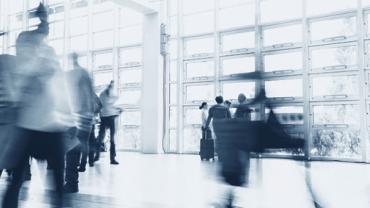 Blurry image of people moving around