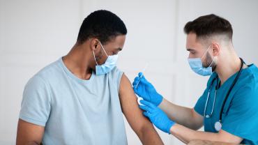 African American man receiving vaccine