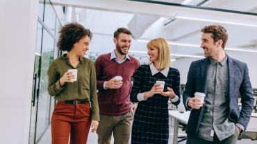 Coworkers chatting in the office