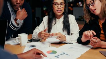 Business team discussing legal data