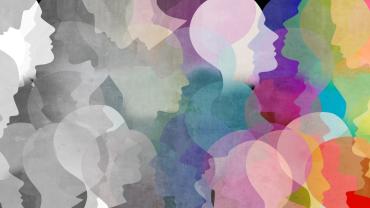 Multicolored silhouettes of heads to convey diversity