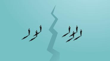 Crack in ground between business people