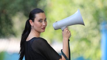 photo of woman with megaphone