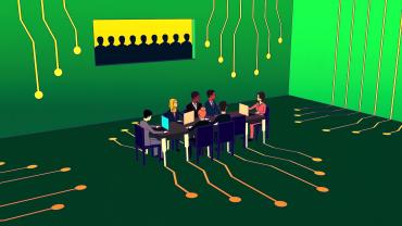 Board room meeting being conducted at a table made out of a microchip.