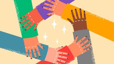 Hands holding each other in a circle. 