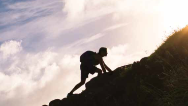 a person climbing a mountain
