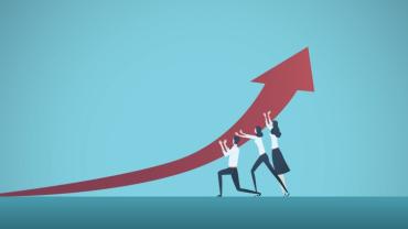 three professionals supporting a large arrow to make it curve upward