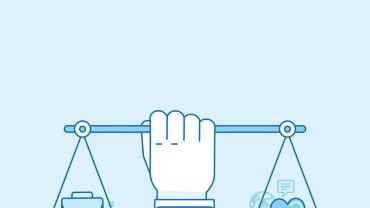 a hand holding balanced scales with a heart on one side and a briefcase on the other