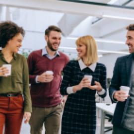 Coworkers chatting in the office