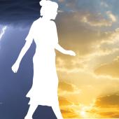 Silhouette of women between storm and sun