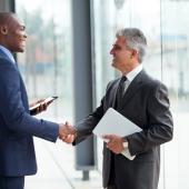 Two businesspeople shaking hands