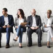 six diverse candidates seated side by side