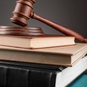gavel sitting on stack of books