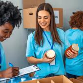 Volunteers assembling care packages