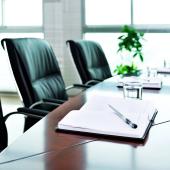 Notepad on conference room table. 