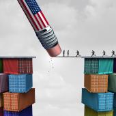 eraser with American flag erasing bridge between containers