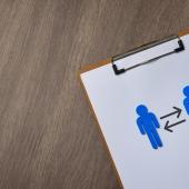 clipboard with arrows between two figures