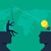 lightbulb being hooked by another person