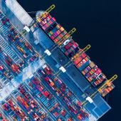 Shipping containers and a freight ship