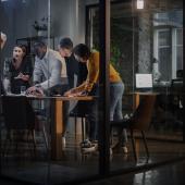 Workers in a tense meeting