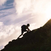 a person climbing a mountain