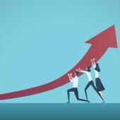 three professionals supporting a large arrow to make it curve upward