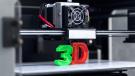 3D printer creating a "3" and "D"