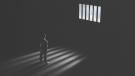 Businessman in jail cell